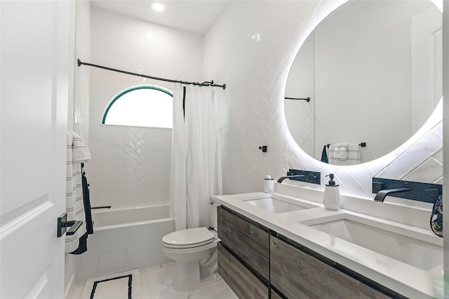 full bathroom with vanity, shower / tub combo, toilet, and tasteful backsplash