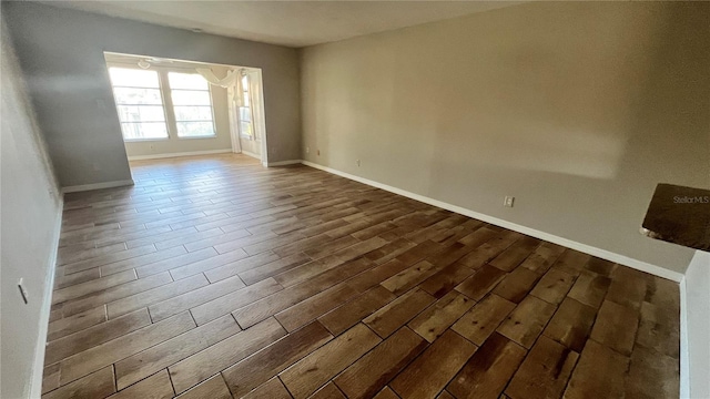 empty room featuring hardwood / wood-style flooring