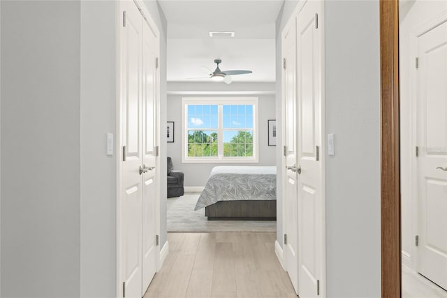 hallway featuring light hardwood / wood-style floors