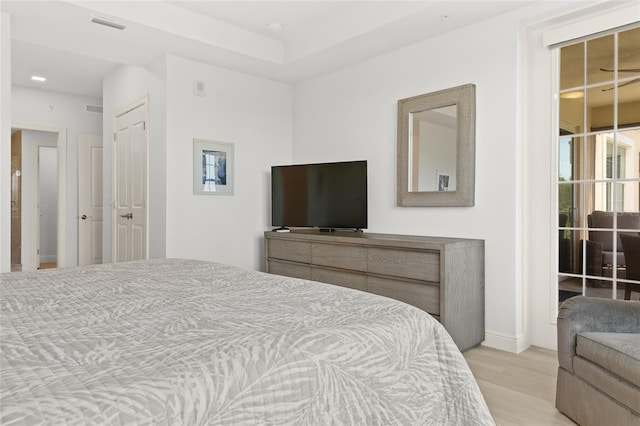 bedroom featuring light hardwood / wood-style floors