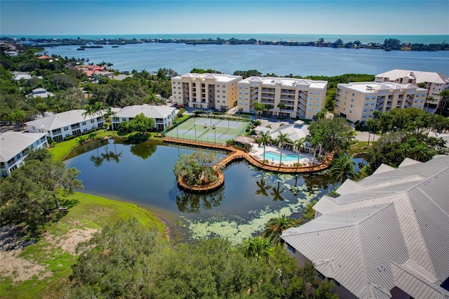 drone / aerial view with a water view