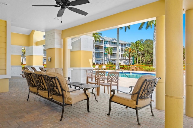 view of patio featuring ceiling fan