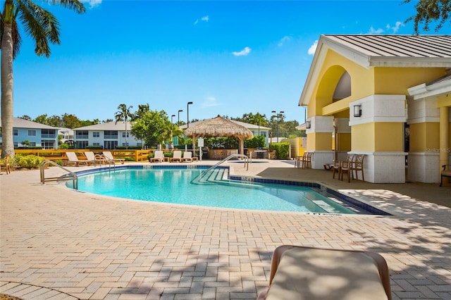 view of pool featuring a gazebo and a patio