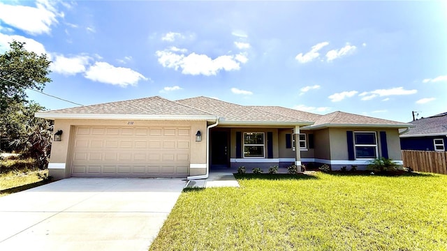 ranch-style home featuring fence, a garage, stucco siding, a front yard, and driveway