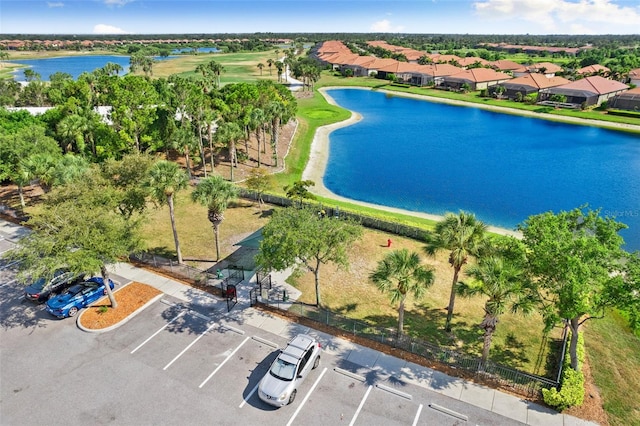 drone / aerial view with a water view