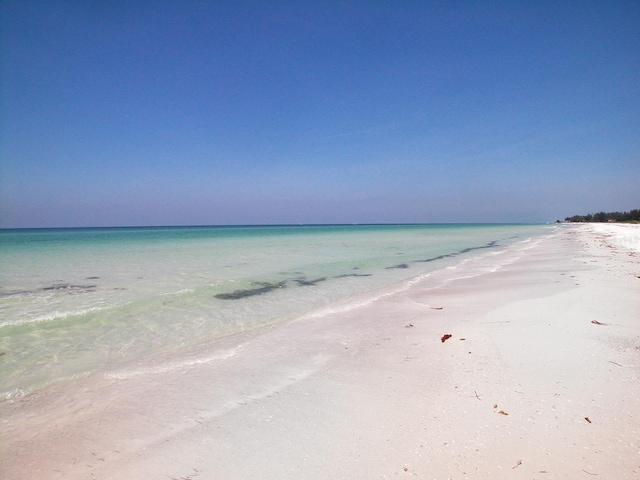 property view of water featuring a view of the beach