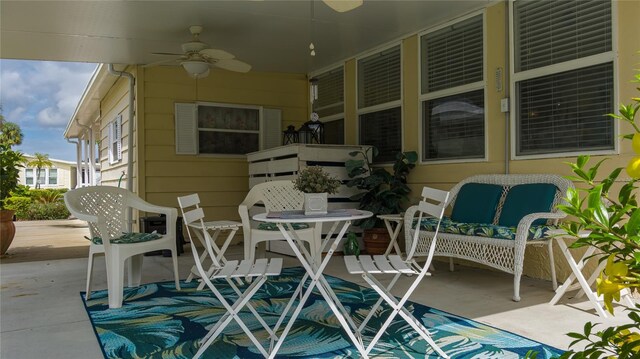 view of patio / terrace featuring ceiling fan