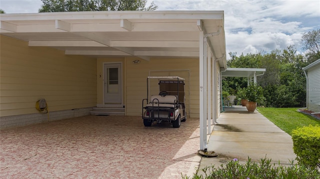 view of patio featuring a carport