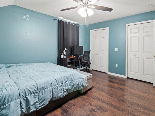 bedroom featuring lofted ceiling, dark hardwood / wood-style floors, and ceiling fan