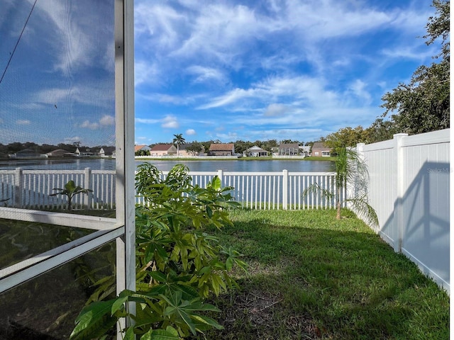 view of yard with a water view