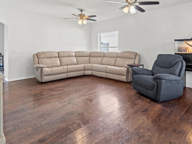 7209 49th Pl E, Palmetto, FL 34221 - living room with baseboards, dark wood-style floors, and ceiling fan