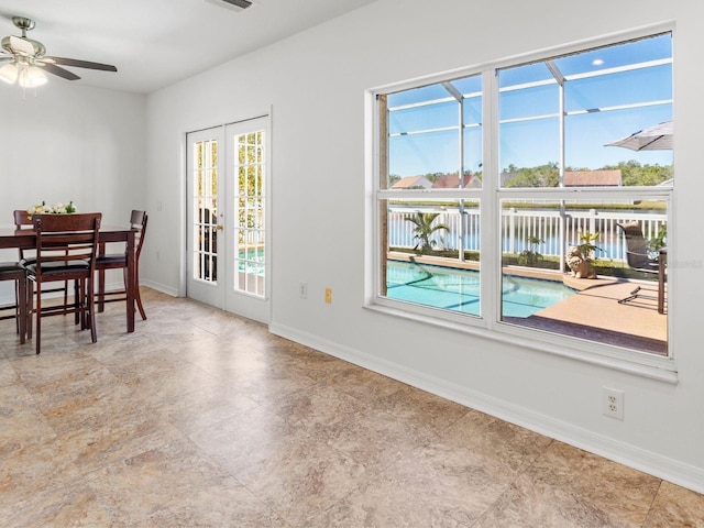 7209 49th Pl E, Palmetto, FL 34221 - dining space with baseboards, a ceiling fan, french doors, and visible vents