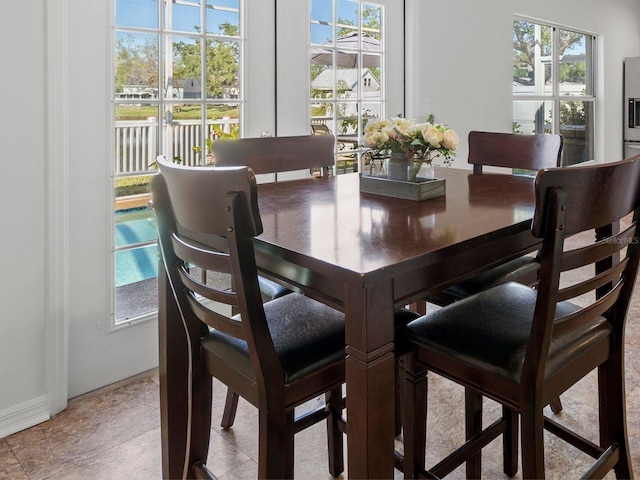 7209 49th Pl E, Palmetto, FL 34221 - dining area with baseboards