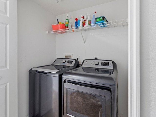 7209 49th Pl E, Palmetto, FL 34221 - clothes washing area with washing machine and dryer and laundry area