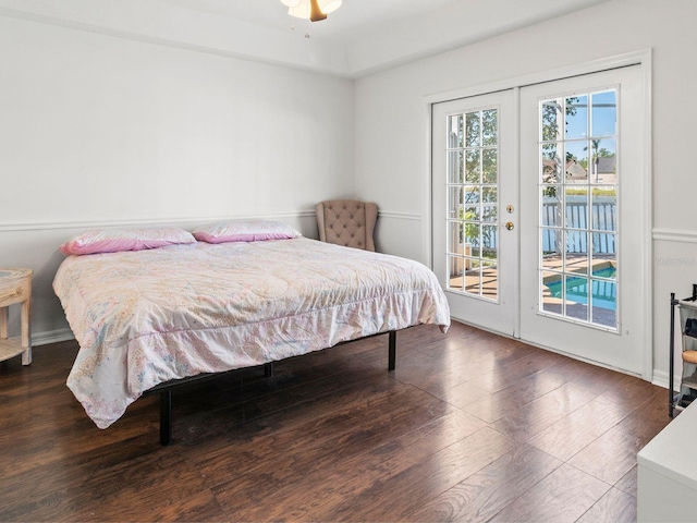 7209 49th Pl E, Palmetto, FL 34221 - bedroom featuring wood finished floors and access to outside