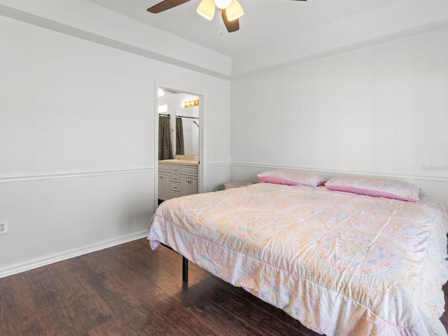 7209 49th Pl E, Palmetto, FL 34221 - bedroom featuring connected bathroom, baseboards, a ceiling fan, and wood finished floors