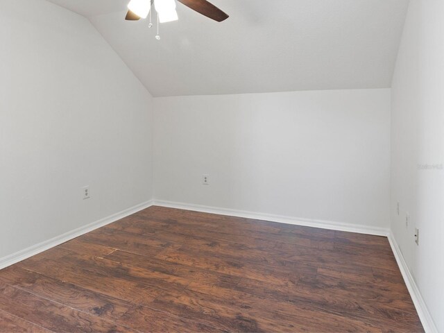 7209 49th Pl E, Palmetto, FL 34221 - bonus room with vaulted ceiling, wood finished floors, baseboards, and ceiling fan