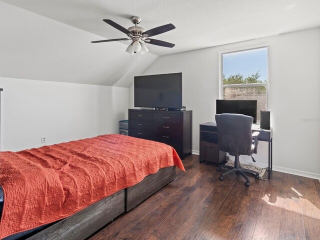 7209 49th Pl E, Palmetto, FL 34221 - bedroom with dark wood finished floors, lofted ceiling, a ceiling fan, and baseboards