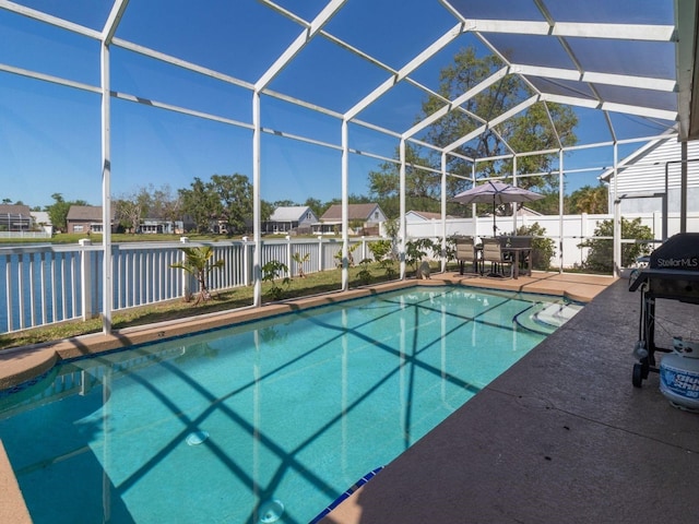7209 49th Pl E, Palmetto, FL 34221 - view of pool with a fenced in pool, a fenced backyard, a residential view, a patio, and a lanai