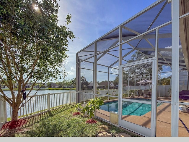 7209 49th Pl E, Palmetto, FL 34221 - view of pool with a water view, a patio area, a fenced backyard, glass enclosure, and a fenced in pool