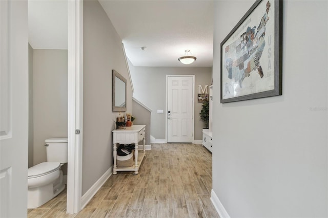 hall featuring light wood-type flooring