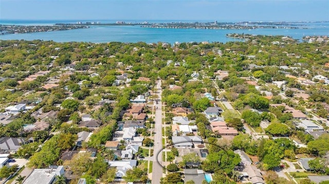 birds eye view of property featuring a water view and a residential view