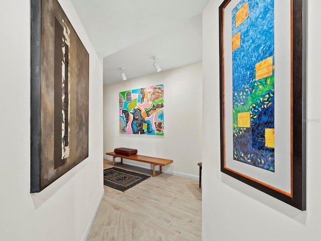 corridor featuring light hardwood / wood-style flooring