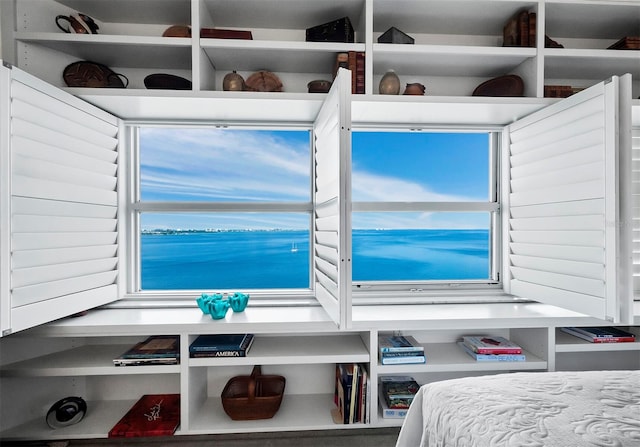 bedroom with a water view