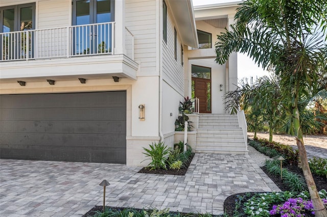 property entrance with a garage