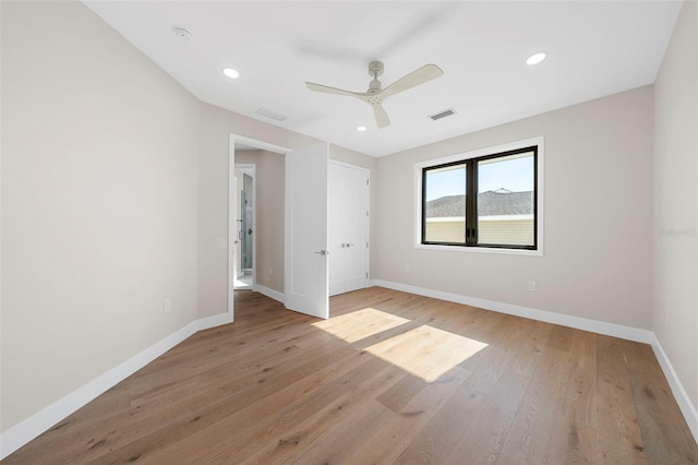 unfurnished bedroom featuring ceiling fan and light hardwood / wood-style floors