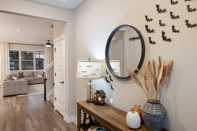 hallway featuring hardwood / wood-style flooring