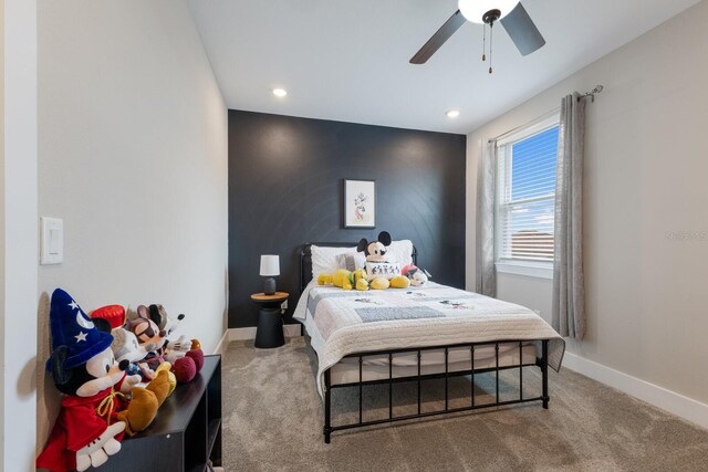 bedroom featuring ceiling fan and carpet flooring