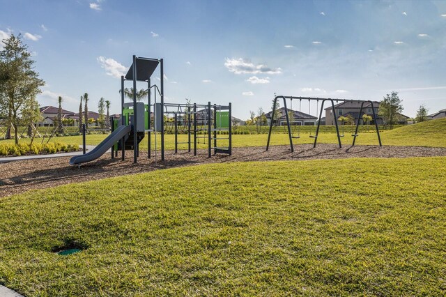 view of playground featuring a yard