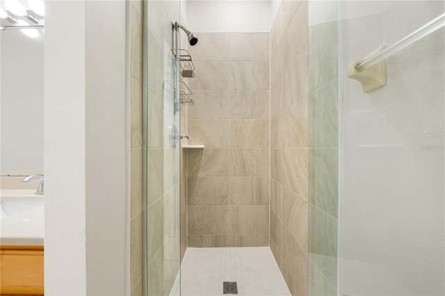 bathroom with vanity and an enclosed shower