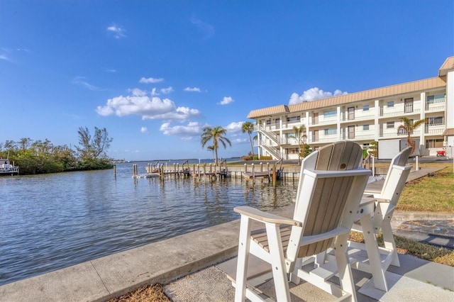 dock area with a water view