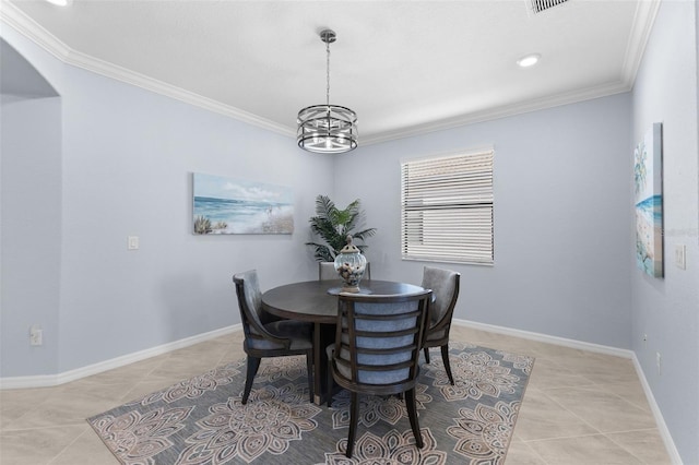 tiled dining area with ornamental molding and an inviting chandelier