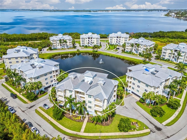 drone / aerial view featuring a water view