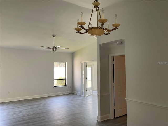 unfurnished room featuring baseboards, dark wood finished floors, and ceiling fan with notable chandelier