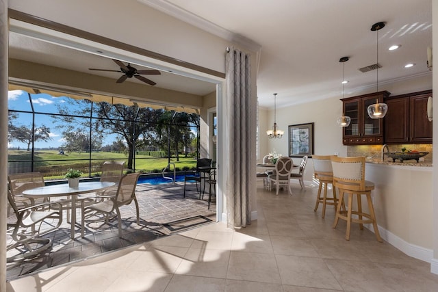 interior space with glass enclosure and ceiling fan