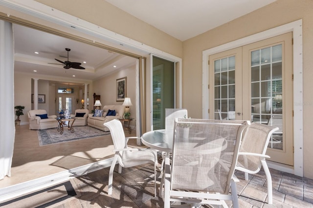 view of patio with ceiling fan and french doors