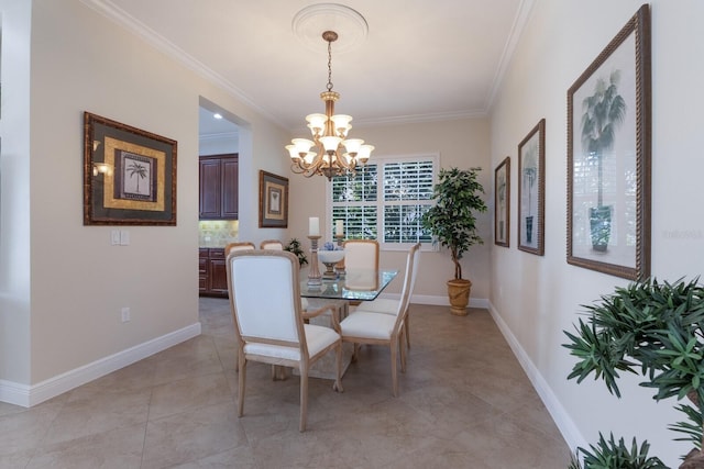 dining space with a chandelier and ornamental molding