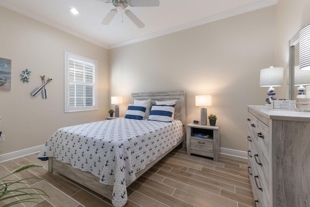 bedroom featuring ceiling fan, crown molding, and light wood-type flooring