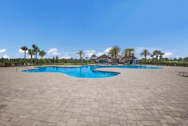 view of pool featuring a patio