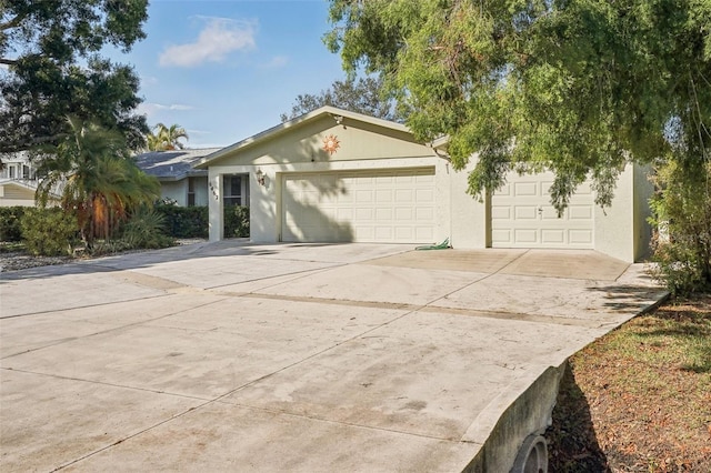 ranch-style home with a garage