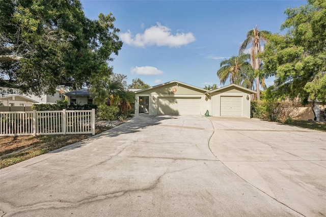 single story home with a garage