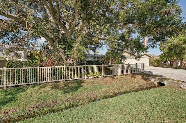 view of yard featuring a garage