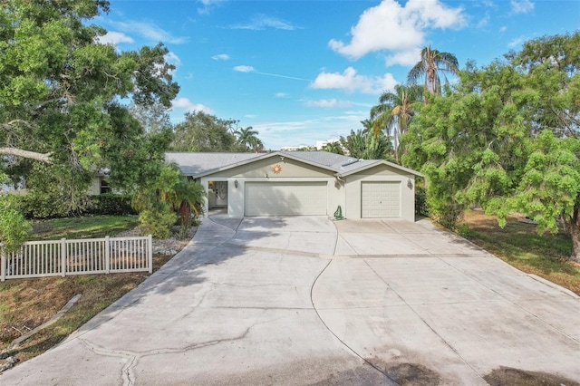 single story home with a garage