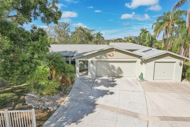 single story home with a garage