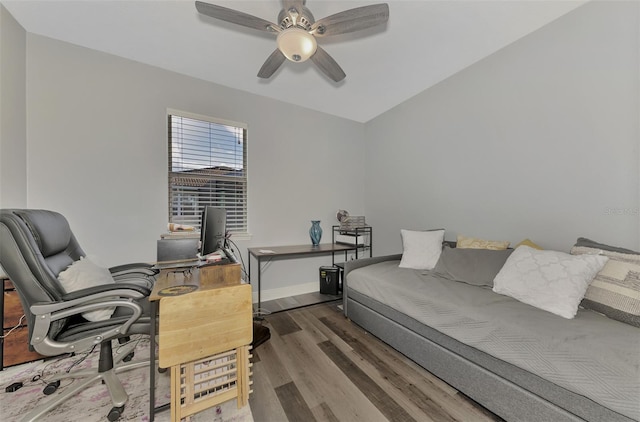 interior space with hardwood / wood-style flooring and ceiling fan