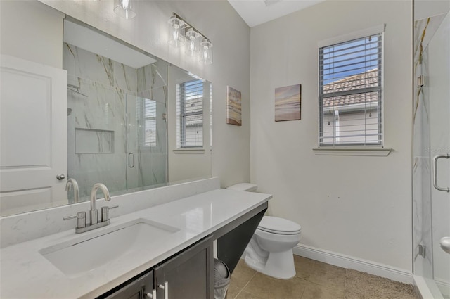 bathroom featuring a shower with door, toilet, tile patterned flooring, and vanity